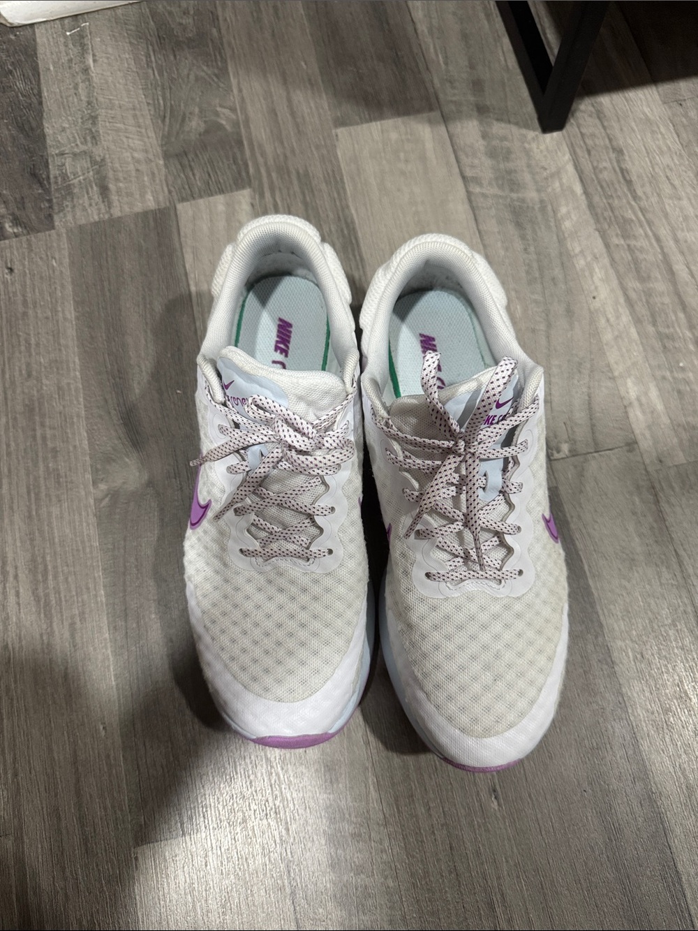 Nike Women’s White Sneakers with Purple Accents